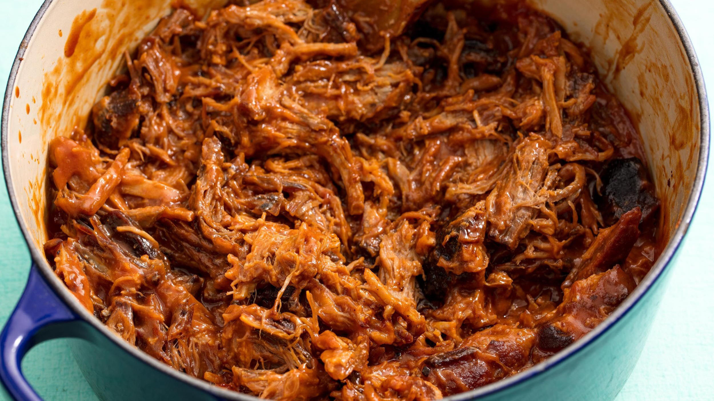 Pulled pork is an American barbecue dish, more specifically a dish of the Southern U.S., based on shredded barbecued pork shoulder. It is typically sl...